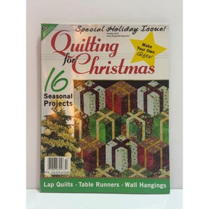 May include: A magazine cover titled "Quilting for Christmas" with a Christmas tree and gift box quilt pattern. The cover includes text that reads "16 Seasonal Projects" and "Make Your Own Gifts!"