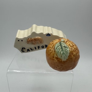 Juego de salero y pimentero de cerámica vintage de California con diseño de oso naranja japonés
