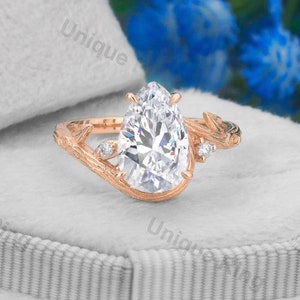 Cottagecore Pear Cut Moissanite Engagement Ring: 14k Gold Leaf Design