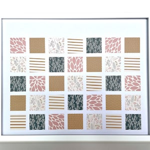Peut inclure: Une impression encadrée avec un motif patchwork présentant divers motifs dans des tons de rose, or et vert. Les motifs comprennent des motifs floraux, géométriques et rayés.