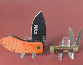 NRA knives by Stone River and Buck (380)