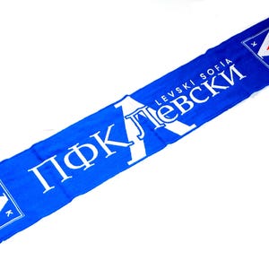 May include: Blue and white scarf with the text "PFK Levski Sofia" and a logo featuring a white triangle with red and yellow accents.
