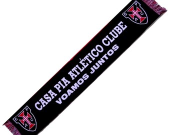 May include: Black and red soccer scarf with the text "CASA PIA ATLÉTICO CLUBE VOAMOS JUNTOS" and a white cross on a red shield.