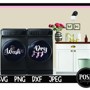 May include: A black and silver washing machine and dryer set with a white background. The washing machine has a label that says "Wash" and the dryer has a label that says "Dry" with pink socks hanging on a clothesline.