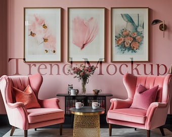 May include: Two pink velvet wingback chairs with pink cushions, a gold wire mesh coffee table with two white mugs, and a black console table with a vase of pink flowers and decorative items in a pink room with three framed prints on the wall.
