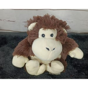Macaco de pelúcia marrom para micro-ondas Warmies com aroma de lavanda