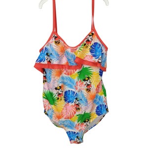 Traje de baño de una pieza con estampado tropical de Minnie Mouse de Disney, tirantes ajustables y detalles de volantes.