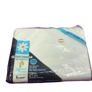 May include: A white, no-iron muslin sheet from Penn-Prest's Fashion Manor line. The sheet is 50% polyester and 50% cotton. It is a double bed size, measuring 81 inches by 104 inches before hemming.