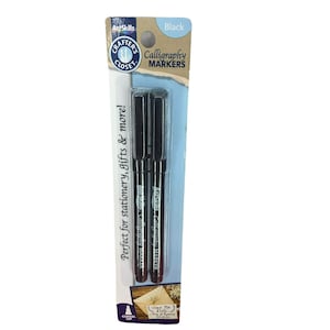 May include: A package of black calligraphy markers from Crafter's Closet. The package includes three markers with chisel tips, perfect for stationery and gifts. The package has the text "ArtSkills" and "Calligraphy MARKERS".
