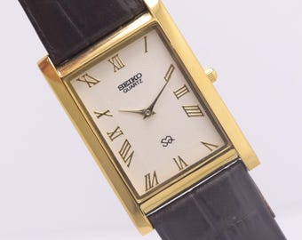 Reloj de pulsera vintage Seiko Slim Tank de cuarzo para hombre: Seiko chapado en oro blanco y negro.