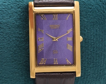 Vintage Seiko Slim Tank Quartz Men's Wrist Watch - Seiko Gold Plated Purple and Brown .