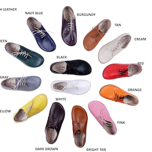 May include: A selection of leather shoes in various colours, including navy blue, burgundy, tan, cream, green, grey, yellow, black, white, dark brown, bright tan, pink, red, and orange.