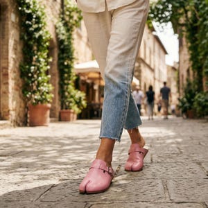 May include: A rustic wooden sign with the text "Welcome to our home" in white lettering. The sign features a distressed finish and a simple, inviting design, perfect for a front porch or entryway.