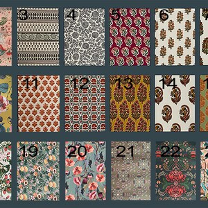 May include: A collection of 24 different fabric swatches with various patterns, including floral, geometric, and paisley designs. The swatches are arranged in a grid of four rows and six columns, with each swatch numbered from 1 to 24.
