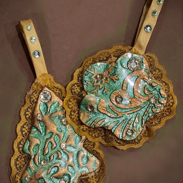 Set of 3 frilly tree ornaments. Embossed metallic mint and gold with jewelled hangers.