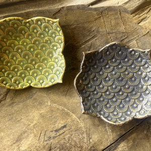 Baroque meets Deco in this unique combo of decorative hand made pottery dishes. Hand coloured and embellished with gold leaf.