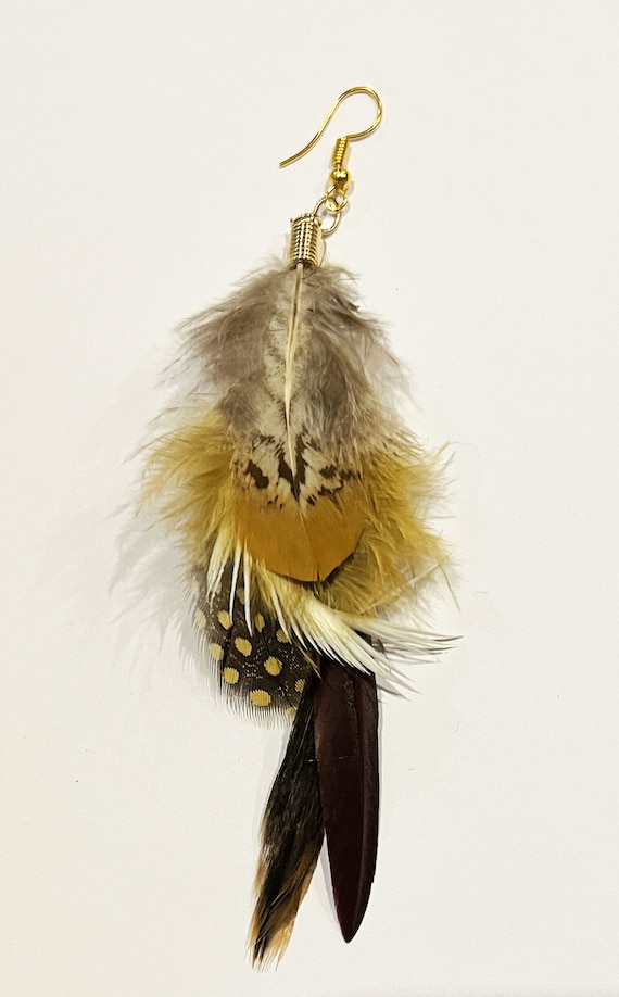 Boho yellow feathered earrings Boho yellow feathered earrings