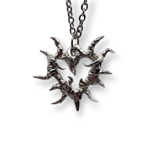 Abstract metal spiky heart pendant