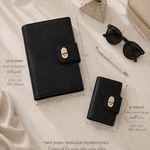 May include: Black A5 planner (5.75" x 7.5") and A7 wallet (4.25" x 5.5") with gold-tone clasps. The image also includes black sunglasses and a white pen. The text reads "Two sizes. Endless possibilities."