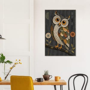 May include: A rectangular wall art print featuring a stylized owl perched on a dark textured branch. The owl has large orange eyes, white, brown, and green patterned feathers, and is flanked by two circular dandelion-like floral illustrations.
