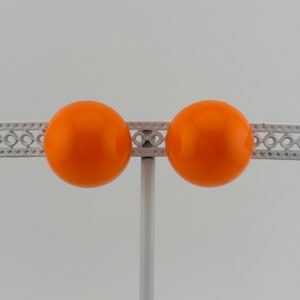Vintage Clip-on Earrings, Neon Orange with Silver Back.