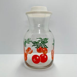 Vintage Carafe with Orange Design and White Lid Made by Anchor Hocking.