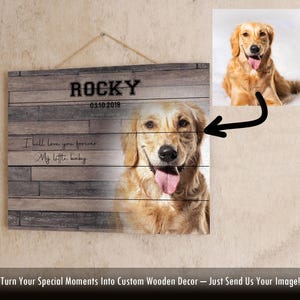 May include: A wooden sign with a photo of a golden retriever dog. The sign says "ROCKY 03.10.2018" and "I will love you forever My little baby".