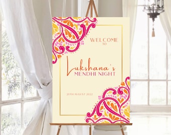 May include: A welcome sign for a Mehndi night, featuring a decorative floral design in shades of pink, orange, and yellow. The text reads "Welcome to Lukshana's Mehndi Night, 20th August 2022".