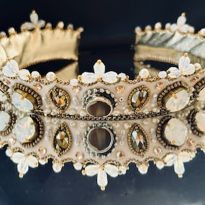 Regal Golden Tiara Adorned with Pearls, Stones, and Glass Beads