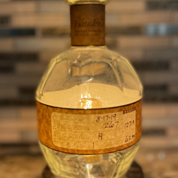 Blanton's Export Bourbon Bottle Lamp bottled on 8/17/19 on a reclaimed bourbon barrel head