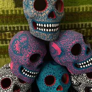 Hand painted small, highly detailed ceramic skull from Mexico—sold individually