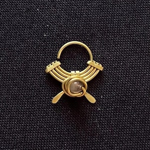 Ornate filigree septum brass piercing with natural amethyst stone handmade in Mexico