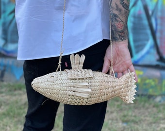 Woven natural palm fish shaped purse from Mexico