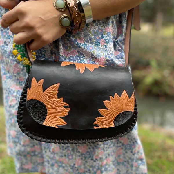 Stamped black leather crossbody purse with stamped yellow sunflower motif from Mexico