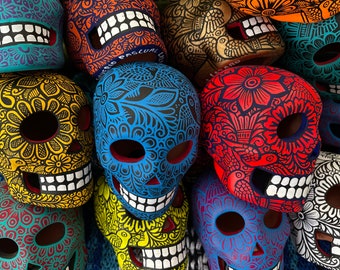 Hand painted brightly colored detailed ceramic skull from Mexico—many colors available, sold individually