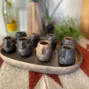 Oaxacan black clay face mezcal tasting bar set for six (6) from San Bartolo Oaxaca and serving plate