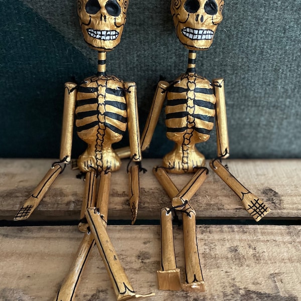 Golden paper mache skeleton figure from Mexico—sold individually