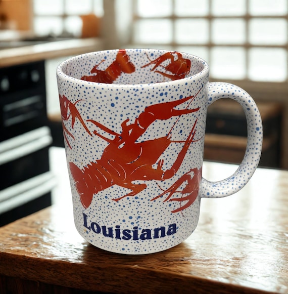 Louisiana themed ceramic mug featuring crawfish.