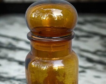 Vintage amber colored apothecary jar. Glass jar with lid.Mid Century Modern Kitchen or Bathroom Canister.Bubble top storage container.