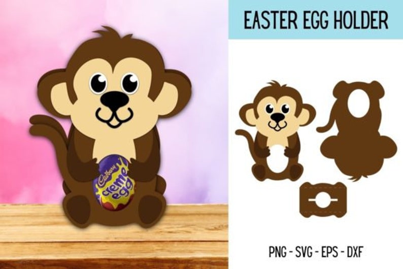 Puede incluir: Un mono marr&oacute;n sosteniendo un huevo de chocolate morado y dorado. El mono est&aacute; sosteniendo el huevo en sus manos y est&aacute; sonriendo. El mono est&aacute; sentado en una superficie de madera. El texto "EASTER EGG HOLDER" est&aacute; en la parte superior de la imagen. El texto "PNG - SVG - EPS - DXF" est&aacute; en la parte inferior de la imagen.