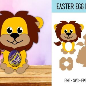 Puede incluir: Una plantilla de artesan&iacute;a imprimible para un porta huevos de Pascua con forma de le&oacute;n de dibujos animados. El le&oacute;n est&aacute; sosteniendo un huevo de chocolate Cadbury Creme Egg en sus patas. La plantilla incluye la cabeza, el cuerpo, la cola del le&oacute;n y una pieza separada para el porta huevos.