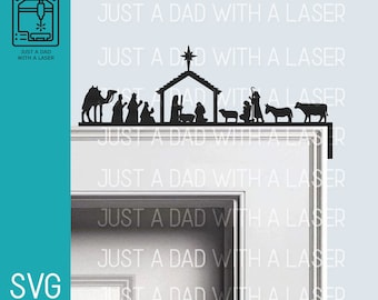 May include: Black metal silhouette of the nativity scene with a camel, three wise men, a shepherd, a sheep, Mary, Joseph, and baby Jesus in a manger. The scene is mounted on a white door frame.