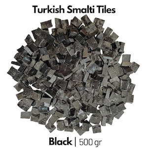 May include: A pile of black Turkish smalti tiles, a type of glass mosaic tile, weighing 500 grams.