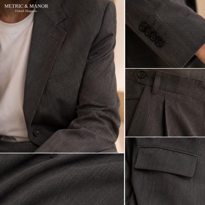 May include: A charcoal grey suit featuring a blazer with a single button closure and a white undershirt. The suit includes detailed views of the sleeve cuffs with four buttons, pleated trousers with a waistband, and a close-up of the fabric texture.