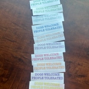 Dogs Welcome People Tolerated Sticker