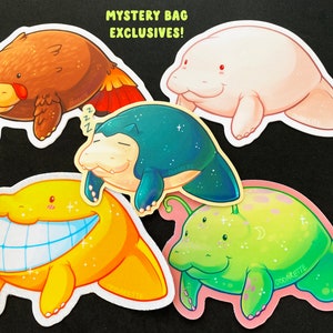 May include: Five colorful stickers featuring cartoon manatees. The stickers are all different colors and have different expressions. The stickers are all about 4 inches wide.  "Mystery Bag Exclusives!" is written at the top of the image.