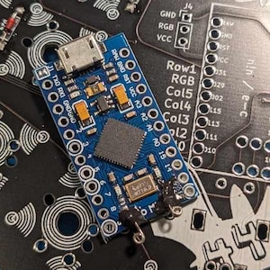 Pro micro with Rx and Tx LED pins (D5/B0) broken out (20 pin pro micro)
