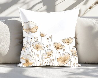 May include: White throw pillow with a brown floral design. The pillow features a line of delicate flowers with thin stems and leaves.