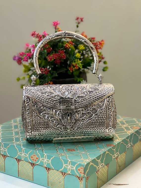 Pin by Muskan Lohiya on Lohiya's | Silver clutch purse, Silver handbag,  Gold handbags