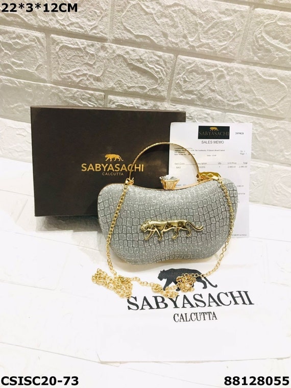 Designer outlet box clutch